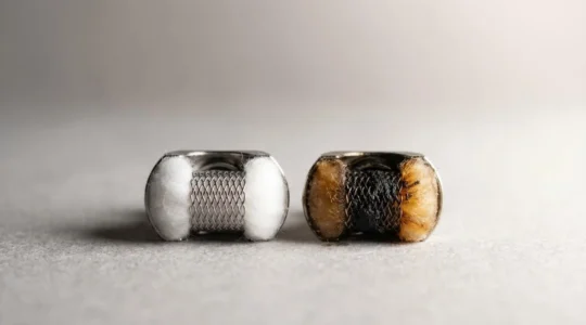 Close-up comparison showing the dramatic difference between a pristine vape coil and a heavily used coil